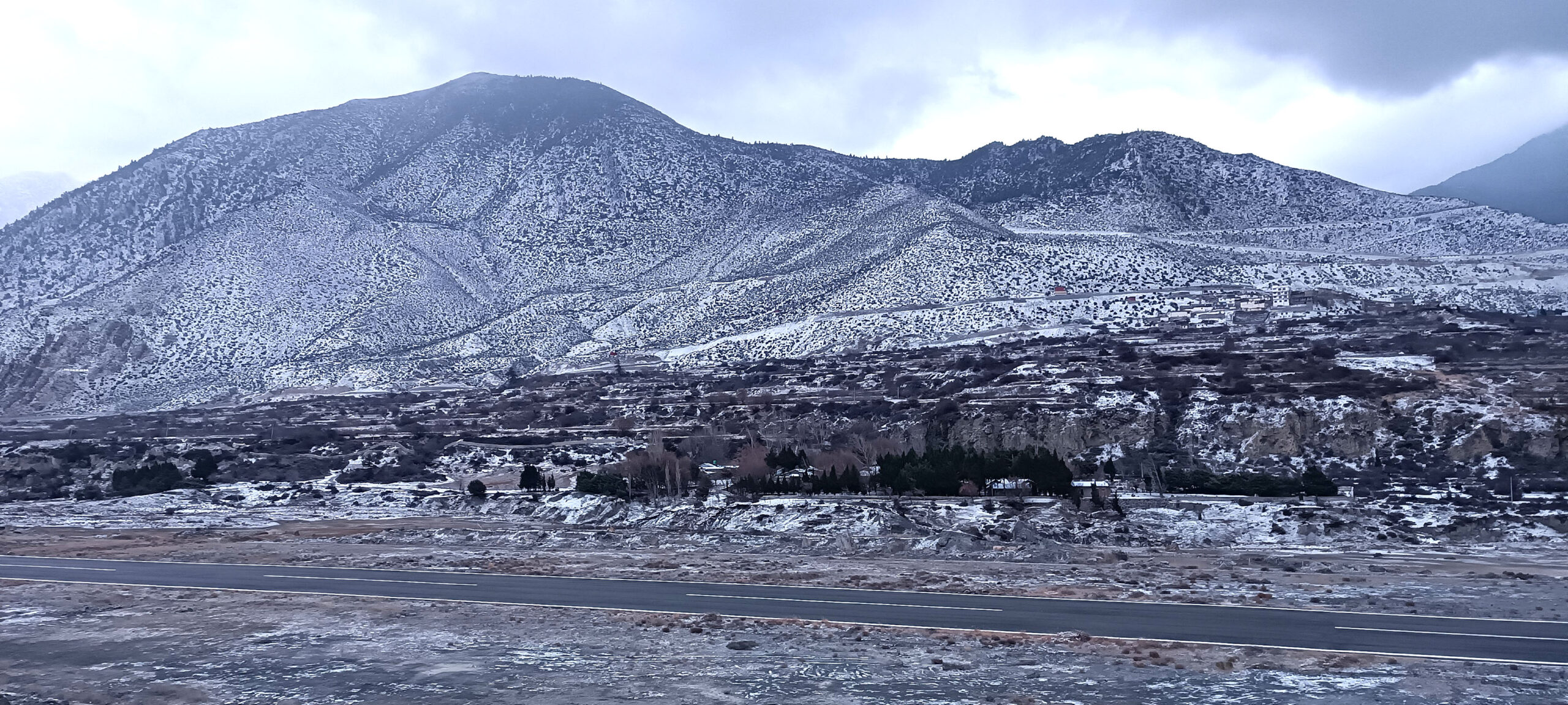 Snowfall in western mountain region disrupts daily life, farmers elated