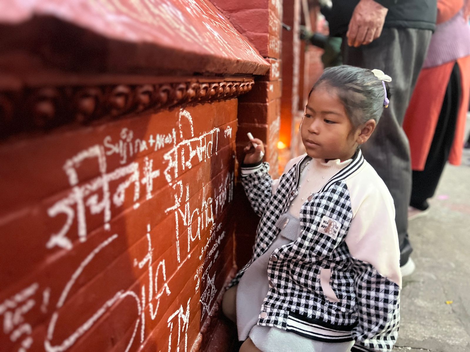 Students, parents lead crowds at Saraswati temple in Swayambhu (photo feature)